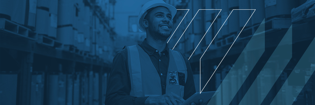 warehouse worker looking ahead with a smile