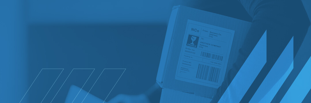 01-the-role-of-shipping-labels-in-inventory-management Person carrying carboard box with a shipping label attached