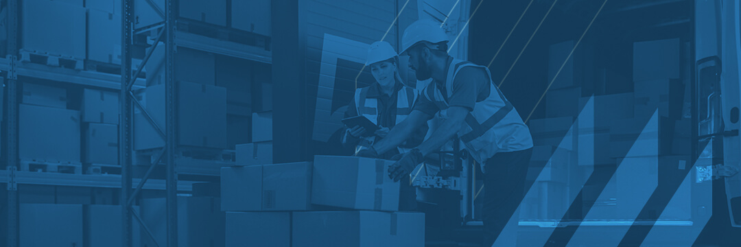 Warehouse workers stacking inventory