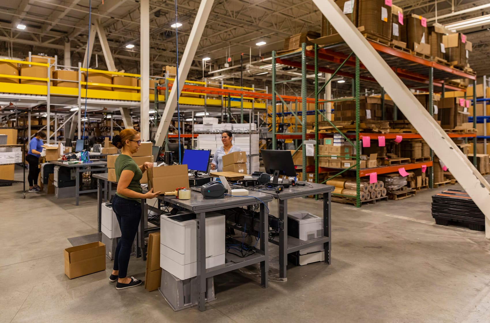 Warehouse workers at shipping station