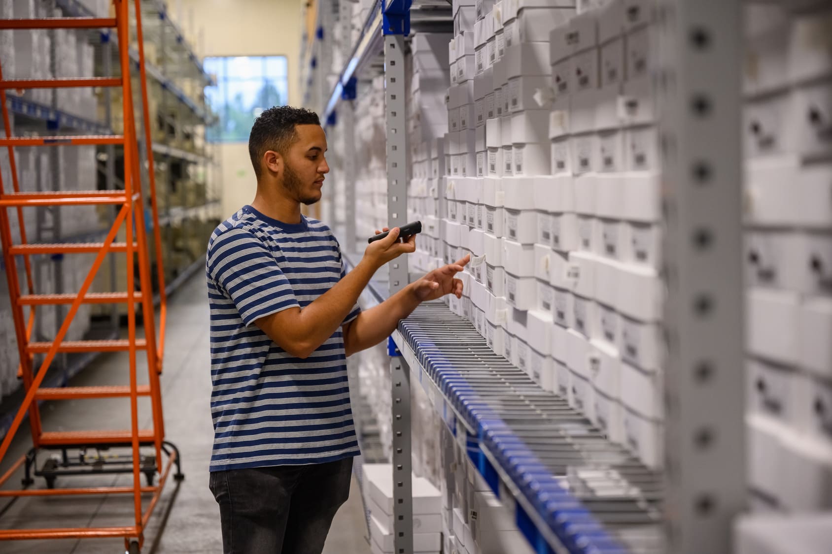 Warehouse worker picking and order to ship to customer